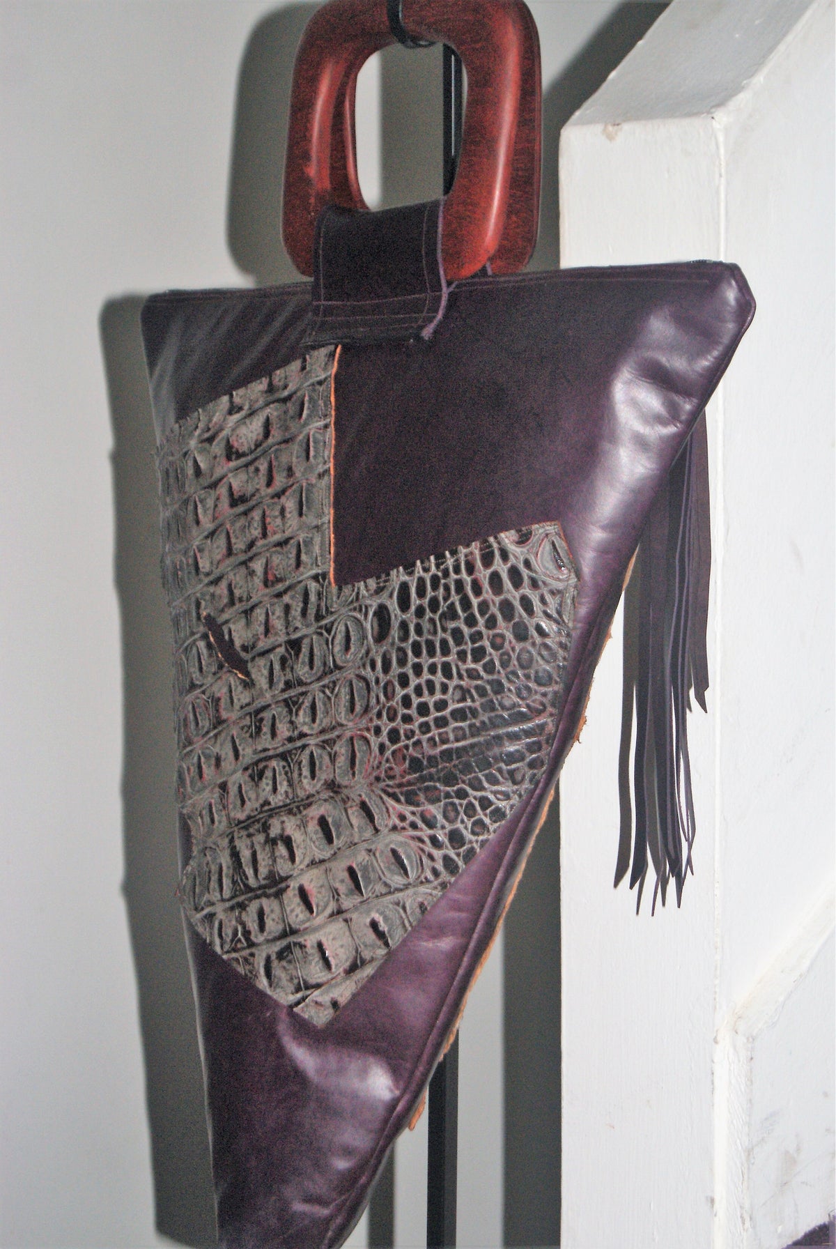 purple handbag back side